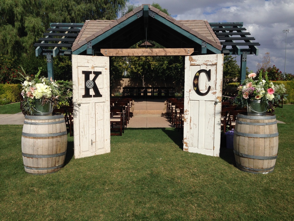 french door entrance and wine barrels